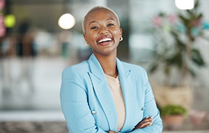 Woman in blue blazer smiling